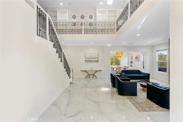 a view of a hallway with seating area