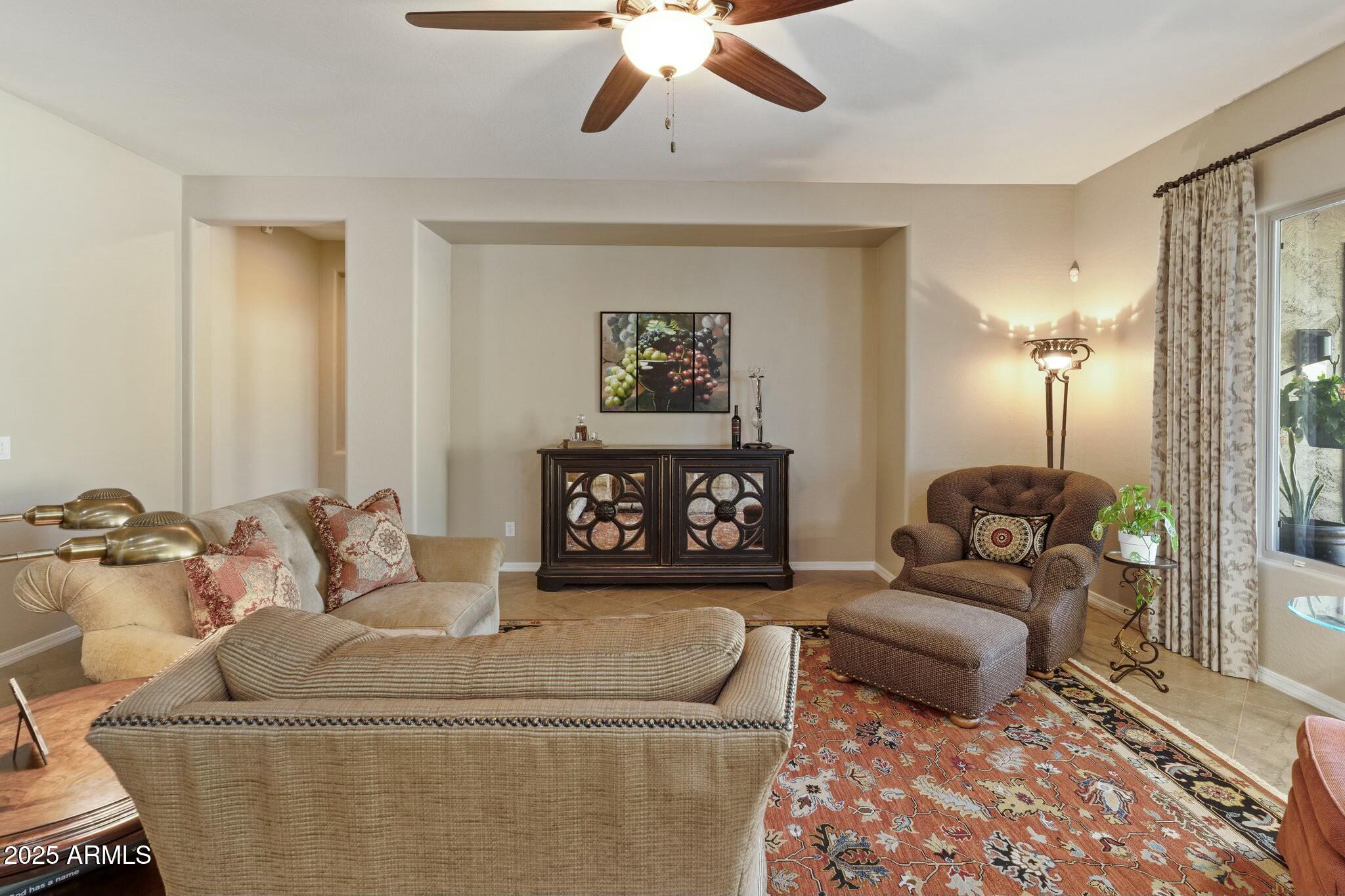 2022 West Steed Ridge Phoenix, AZ 85085 - Photo 16 of 85 a living room with furniture and a couch