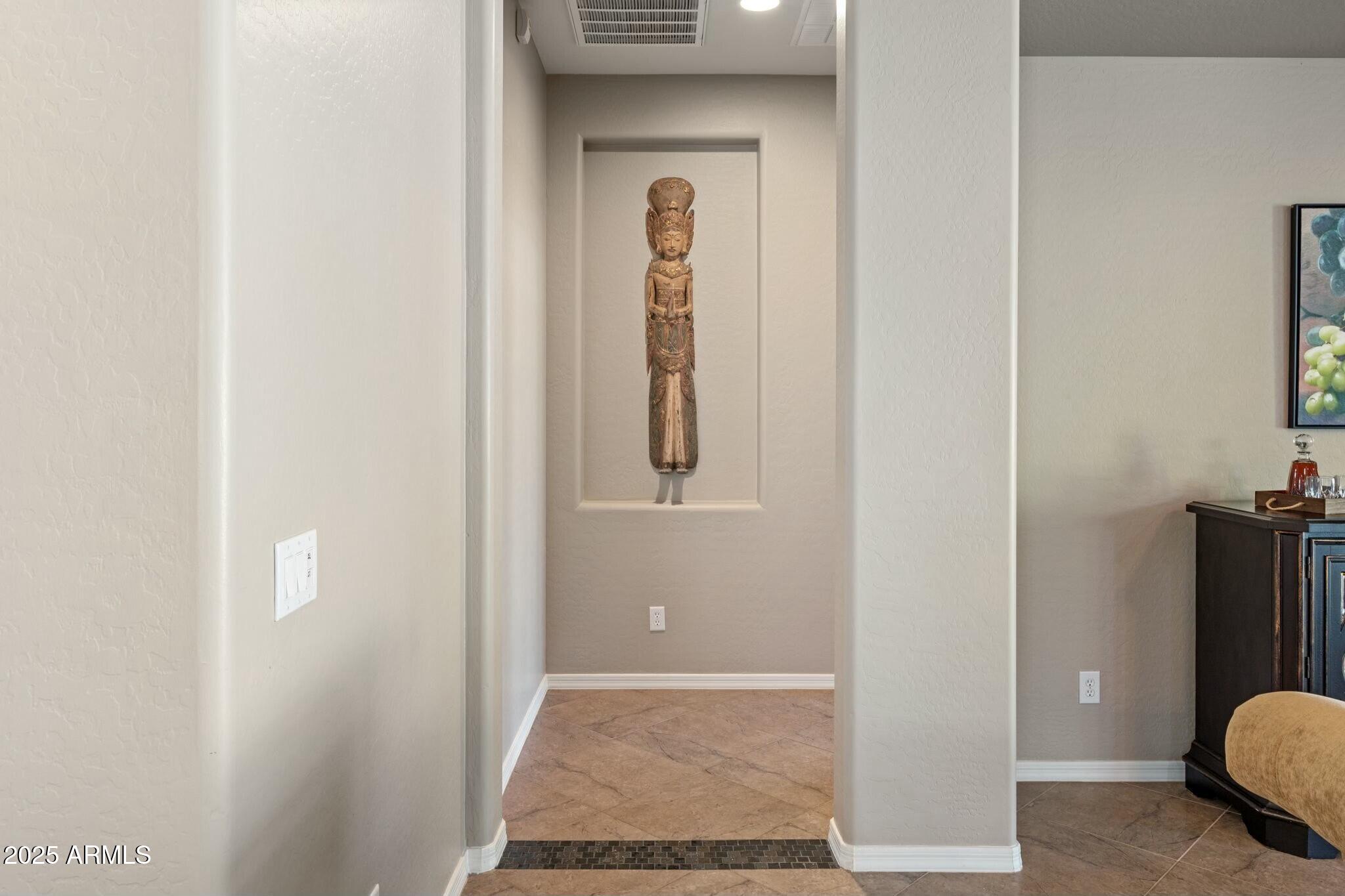 2022 West Steed Ridge Phoenix, AZ 85085 - Photo 20 of 85 a view of a hallway with wooden floor and closet