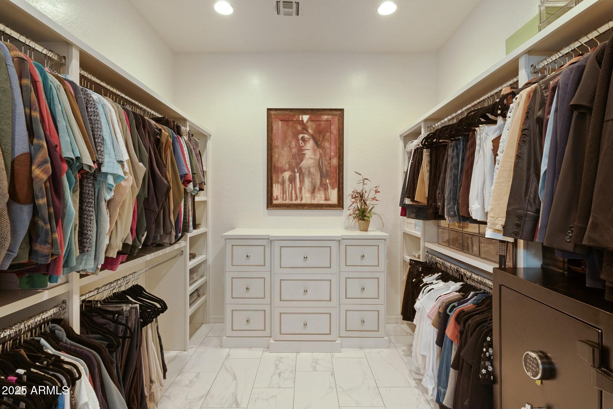 2022 West Steed Ridge Phoenix, AZ 85085 - Photo 27 of 85 a view of walk in closet with clothes