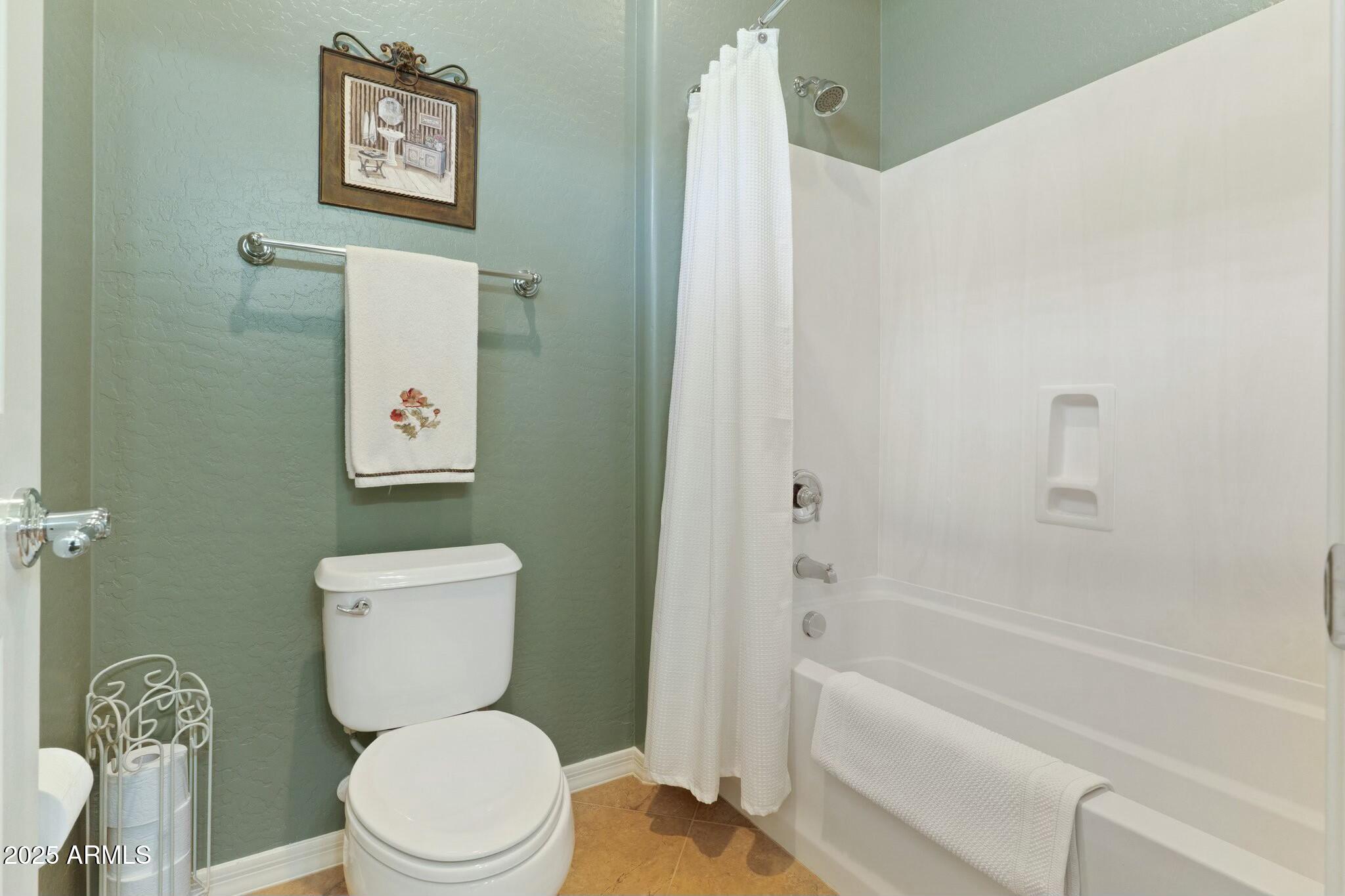 2022 West Steed Ridge Phoenix, AZ 85085 - Photo 40 of 85 a white toilet sitting next to a bath tub