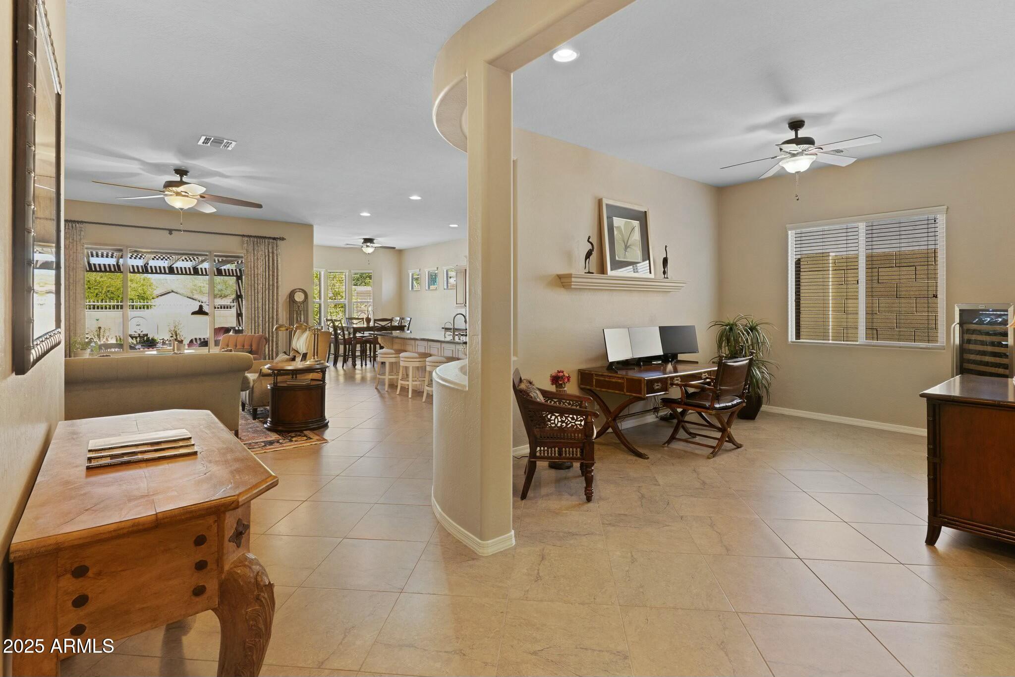 2022 West Steed Ridge Phoenix, AZ 85085 - Photo 8 of 85 a living room with furniture and a potted plant