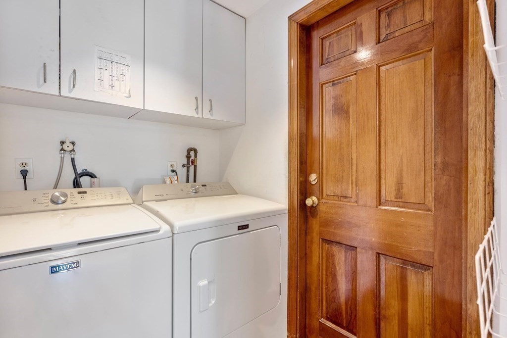 95 Wood End Road Newton, MA 02461 - Photo 15 of 28 a kitchen with a sink and cabinets