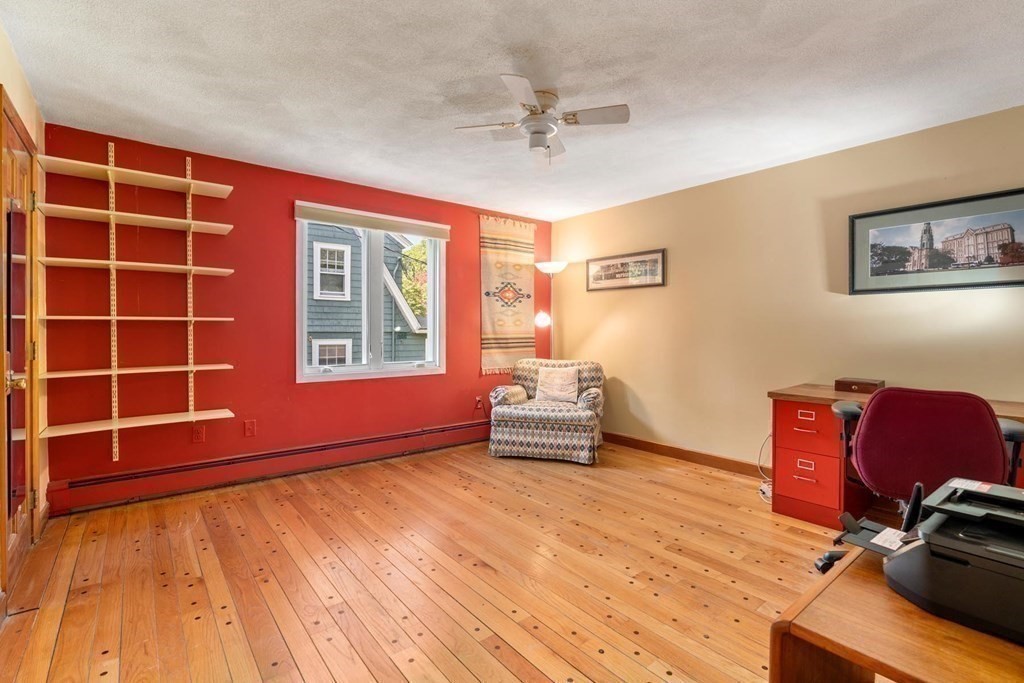 95 Wood End Road Newton, MA 02461 - Photo 20 of 28 a living room with furniture and a wooden floor