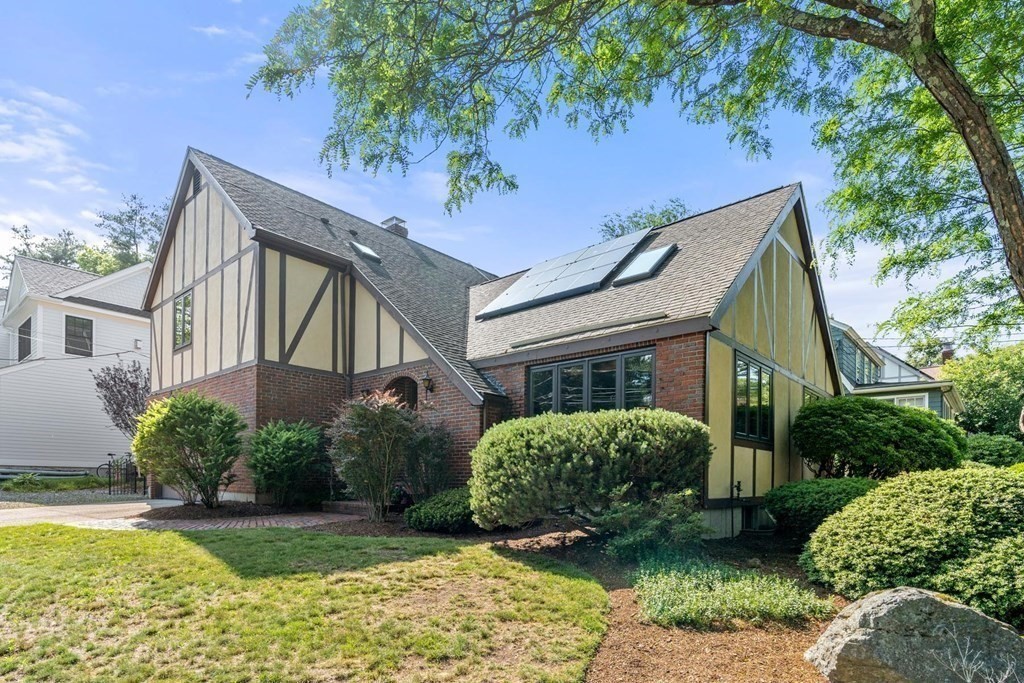 95 Wood End Road Newton, MA 02461 - Photo 2 of 28 a view of a house with a garden