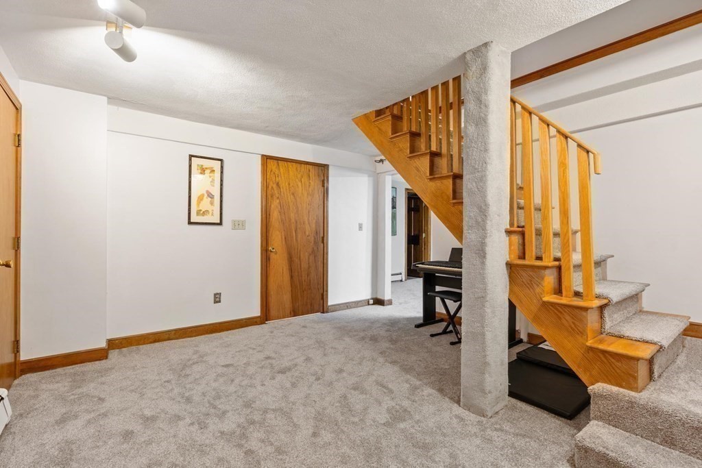 95 Wood End Road Newton, MA 02461 - Photo 22 of 28 a view of an entryway with wooden floor