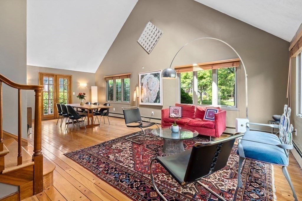 95 Wood End Road Newton, MA 02461 - Photo 4 of 28 a living room with fireplace furniture and a large window