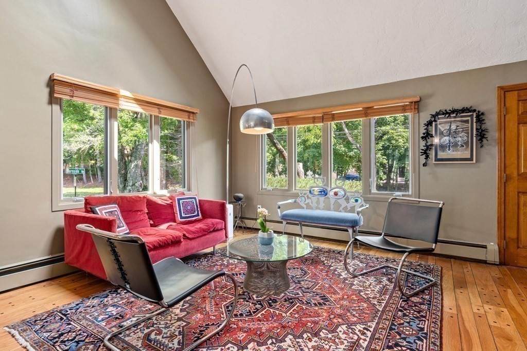 95 Wood End Road Newton, MA 02461 - Photo 5 of 28 a living room with furniture and a large window