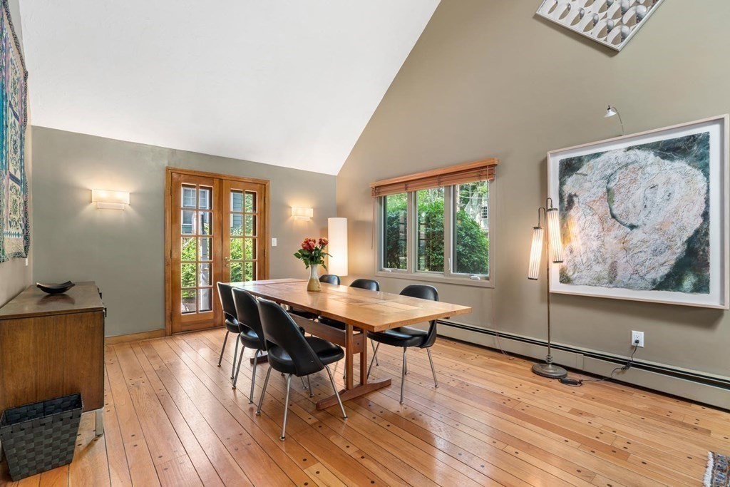 95 Wood End Road Newton, MA 02461 - Photo 6 of 28 a view of a dining room with furniture window and wooden floor