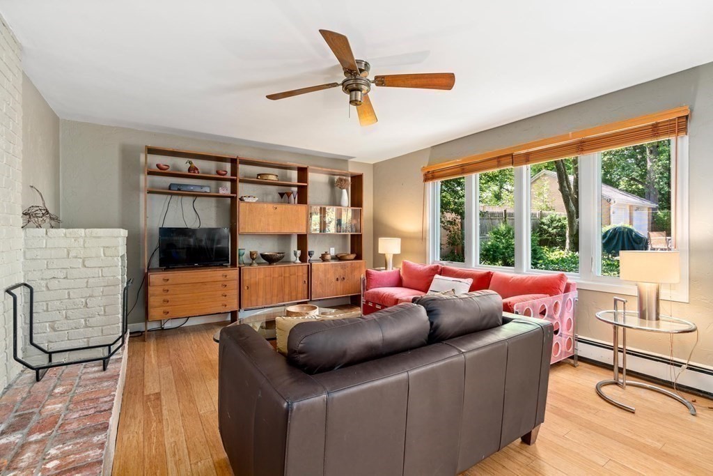 95 Wood End Road Newton, MA 02461 - Photo 10 of 28 a living room with furniture and a large window