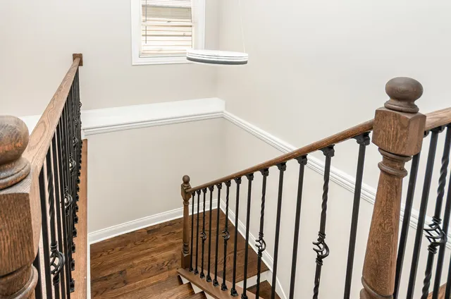 a view of entryway with wooden floor