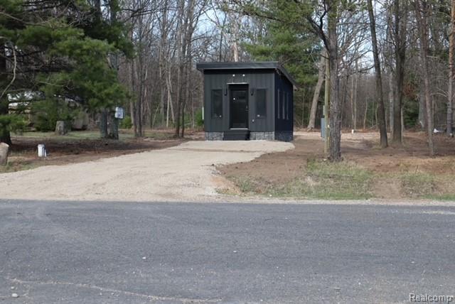 1545 South La Chance Road Lake City, MI 49651 - Photo 19 of 51 View of front of home featuring dirt driveway