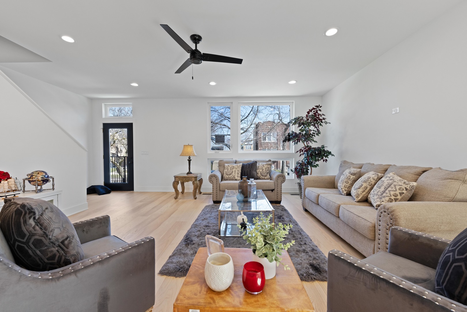 1522 North Leamington Avenue Chicago, IL 60651 - Photo 2 of 37 a living room with furniture and a wooden floor