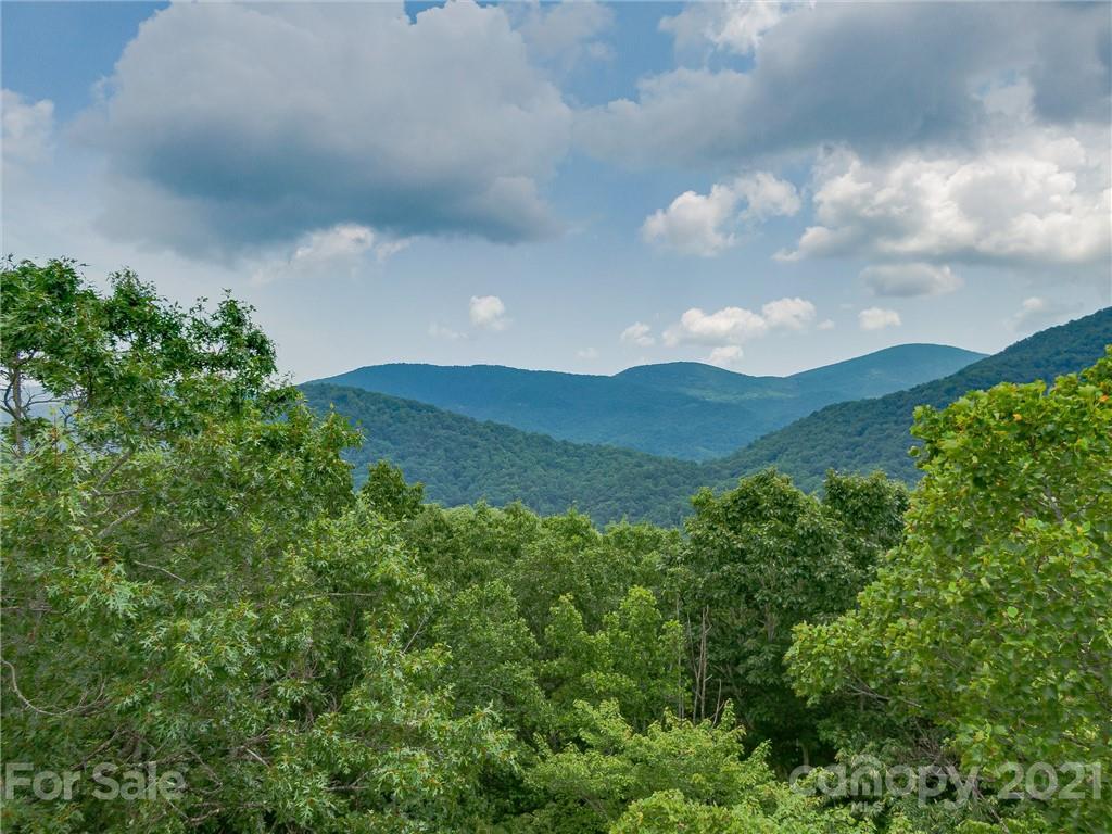 0 Slick Rock Road Hendersonville, NC 28792 - Photo 2 of 41 a view of a house in a field