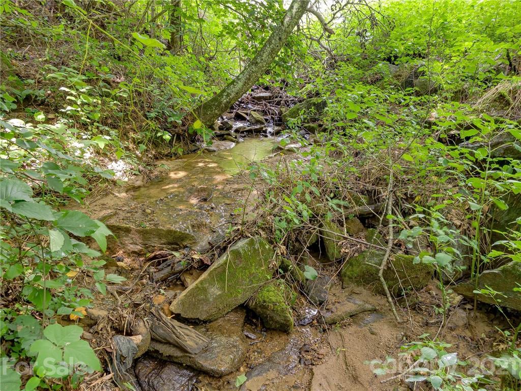 0 Slick Rock Road Hendersonville, NC 28792 - Photo 3 of 41 a view of outdoor space and a yard