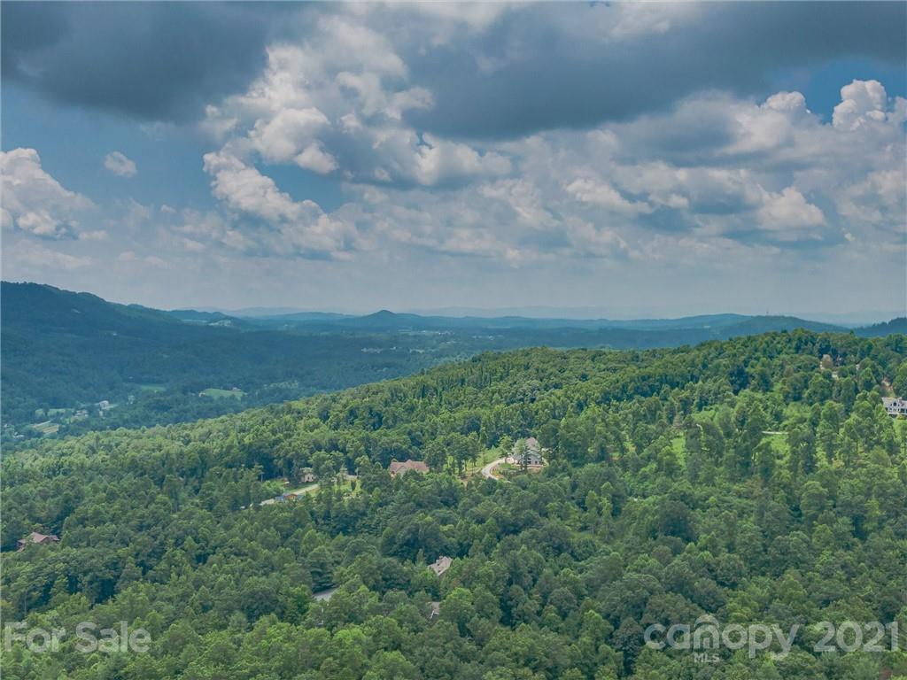 0 Slick Rock Road Hendersonville, NC 28792 - Photo 32 of 41 a view of a big yard with lots of green space