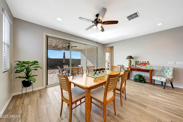 a bathroom with a double vanity sink mirror and shower