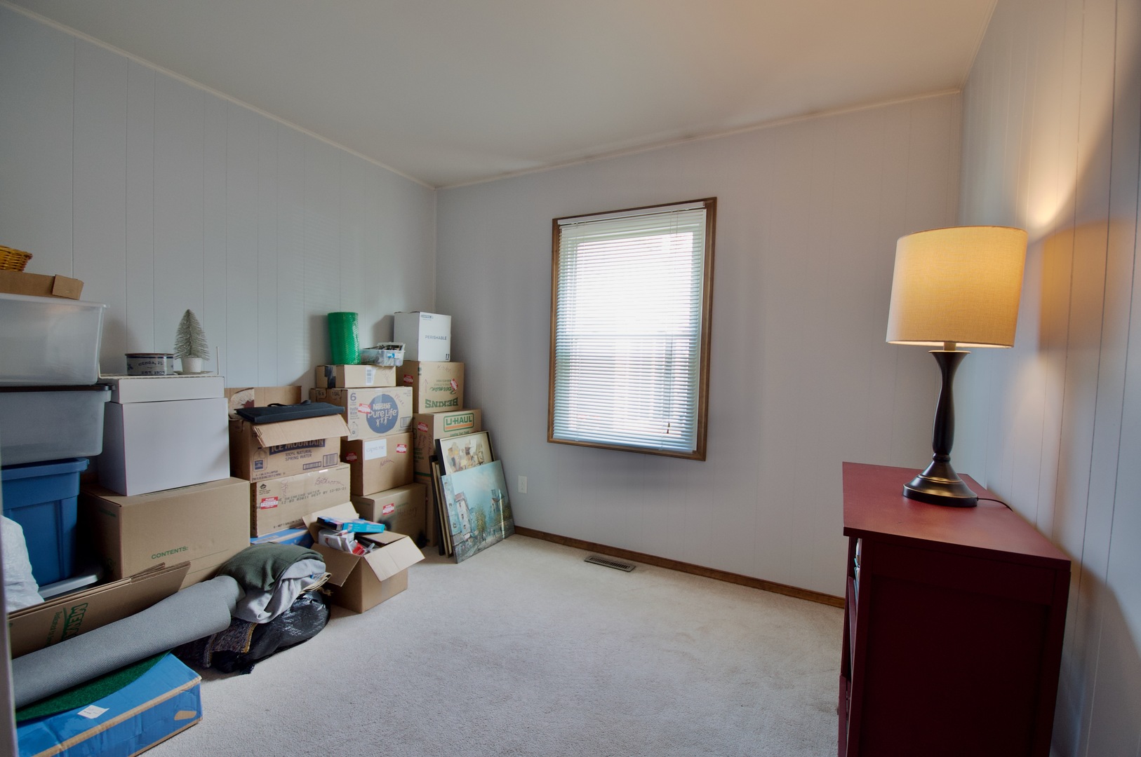 150 Heathgate Road Montgomery, IL 60538 - Photo 14 of 25 a room with furniture and a window