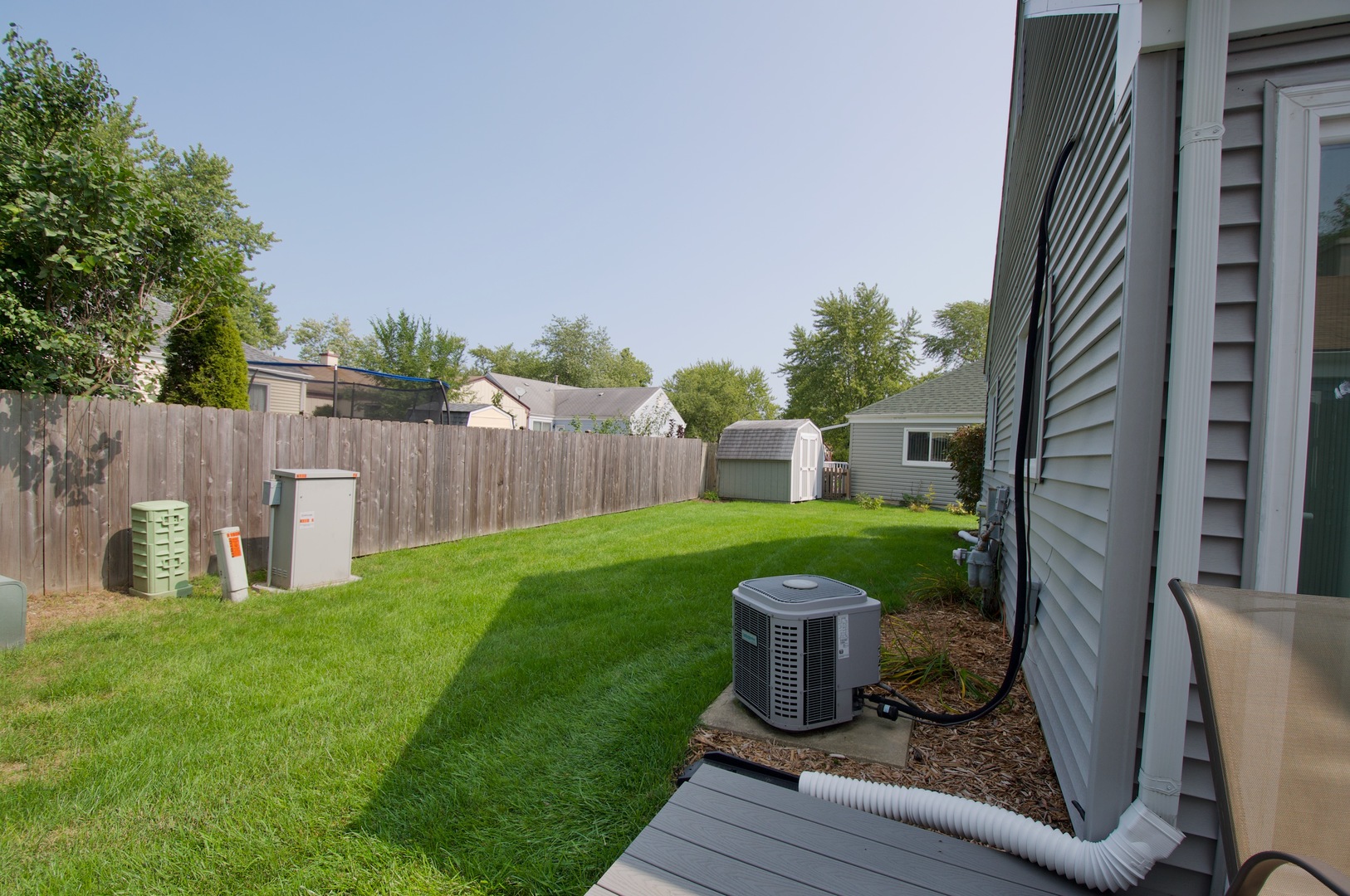 150 Heathgate Road Montgomery, IL 60538 - Photo 22 of 25 a view of a house with backyard sitting area and garden