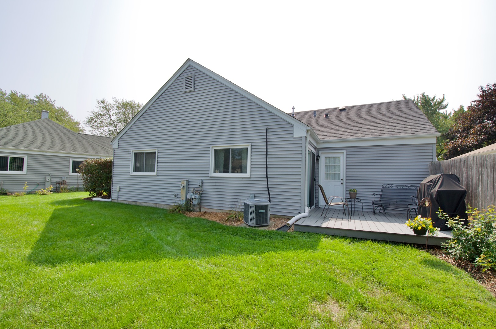 150 Heathgate Road Montgomery, IL 60538 - Photo 23 of 25 a backyard of a house with table and chairs