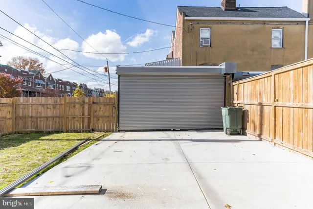 a front view of a house with a garage