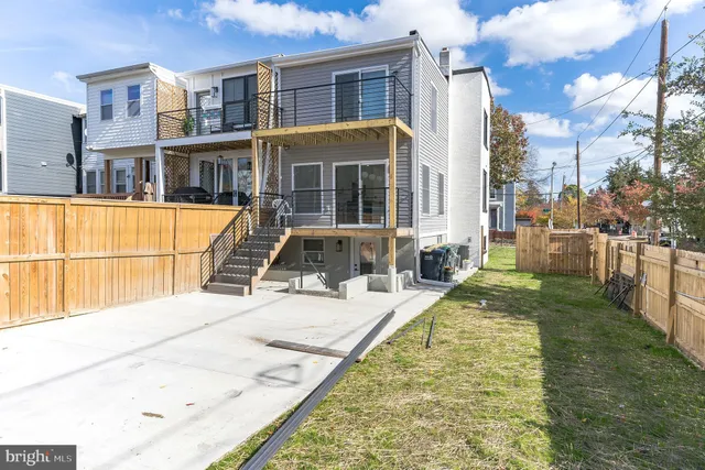 a view of a swimming pool with a lounge chairs