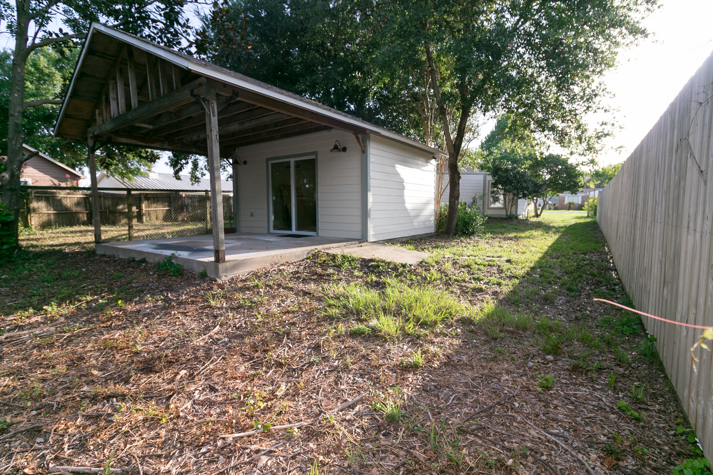 502 3rd Avenue Destin, FL 32541 - Photo 14 of 18 a view of a house with backyard and sitting area