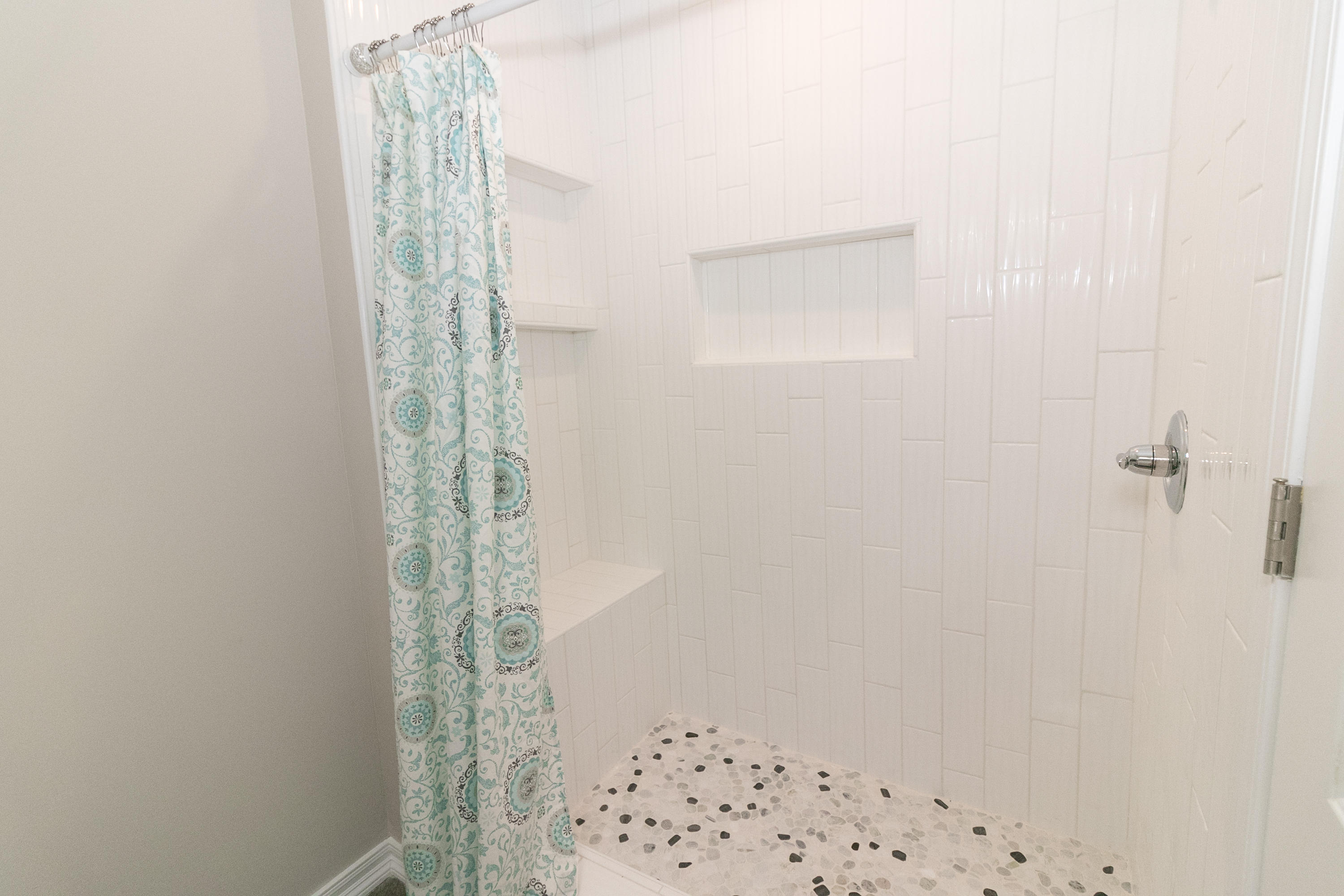 502 3rd Avenue Destin, FL 32541 - Photo 9 of 18 a bathroom with a shower curtain