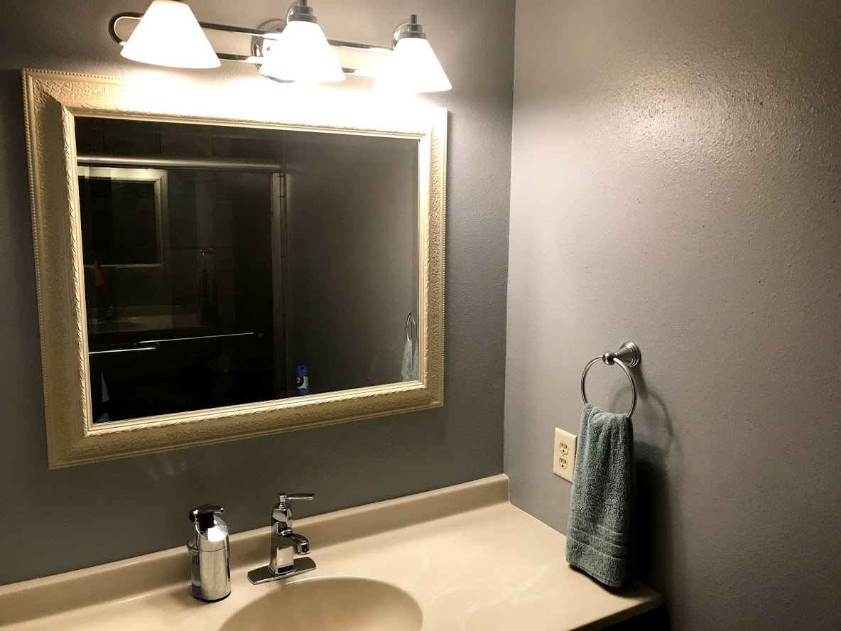 6617 Barkridge Road Roscoe, IL 61073 - Photo 11 of 19 a bathroom with a sink and mirror