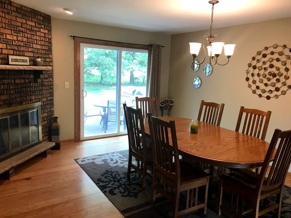 6617 Barkridge Road Roscoe, IL 61073 - Photo 5 of 19 a view of a dining room with furniture window and wooden floor