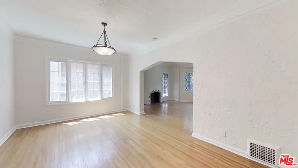 a view of livingroom with hardwood floor and window