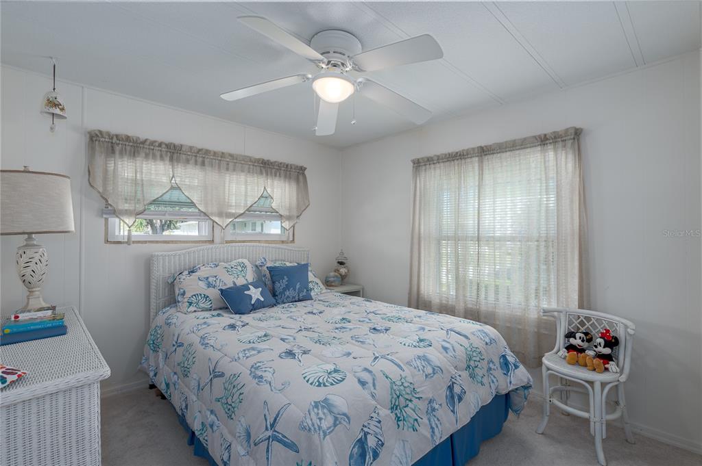 1416 41st Avenue East Ellenton, FL 34222 - Photo 13 of 26 a bedroom with a bed and window