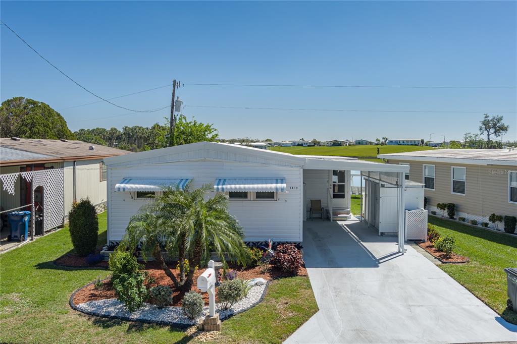 1416 41st Avenue East Ellenton, FL 34222 - Photo 20 of 26 a view of a swimming pool with a patio
