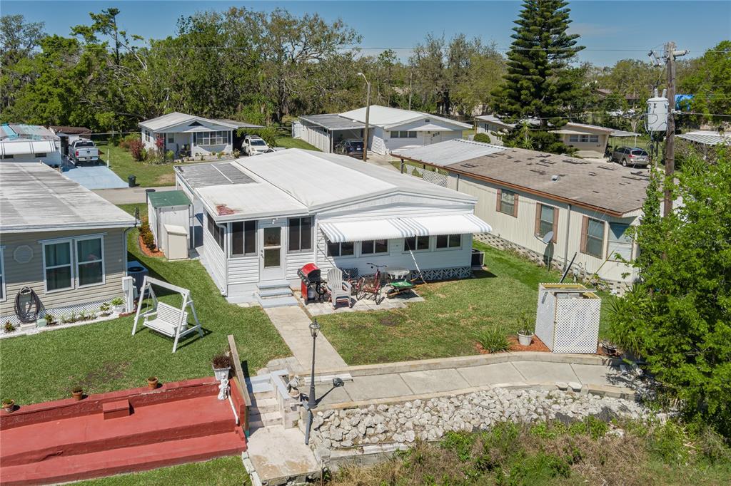 1416 41st Avenue East Ellenton, FL 34222 - Photo 25 of 26 a front view of a house with garden
