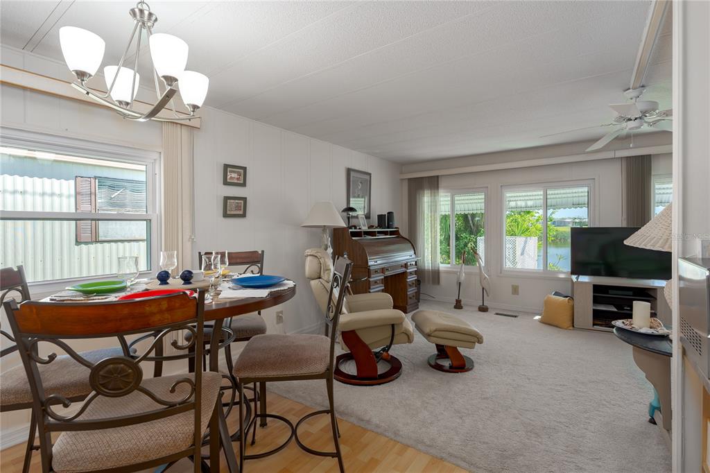 1416 41st Avenue East Ellenton, FL 34222 - Photo 6 of 26 a view of a dining room with furniture window and outside view