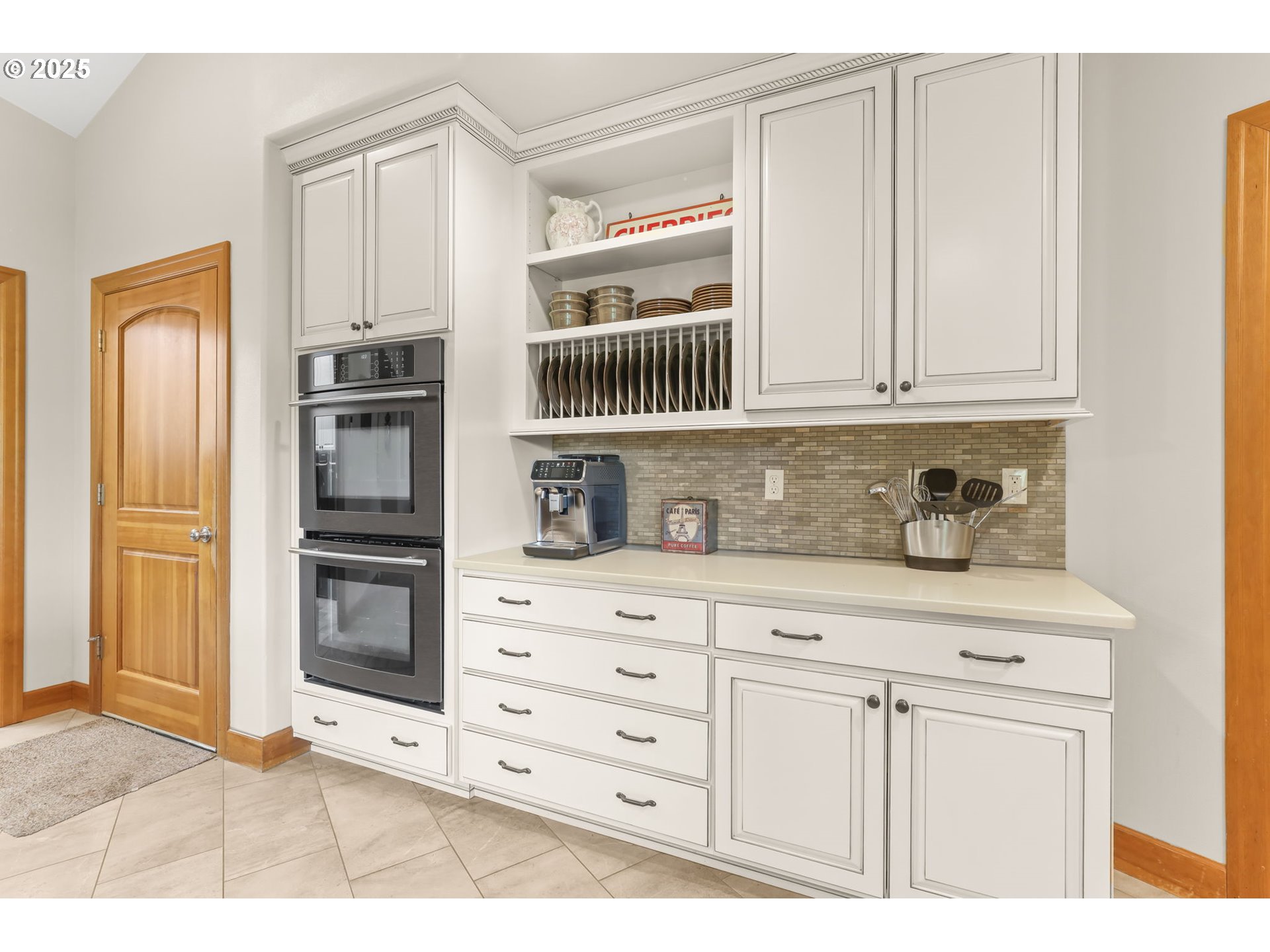 8443 Southeast Orient Drive Gresham, OR 97080 - Photo 11 of 48 a kitchen with stainless steel appliances granite countertop a refrigerator and cabinets