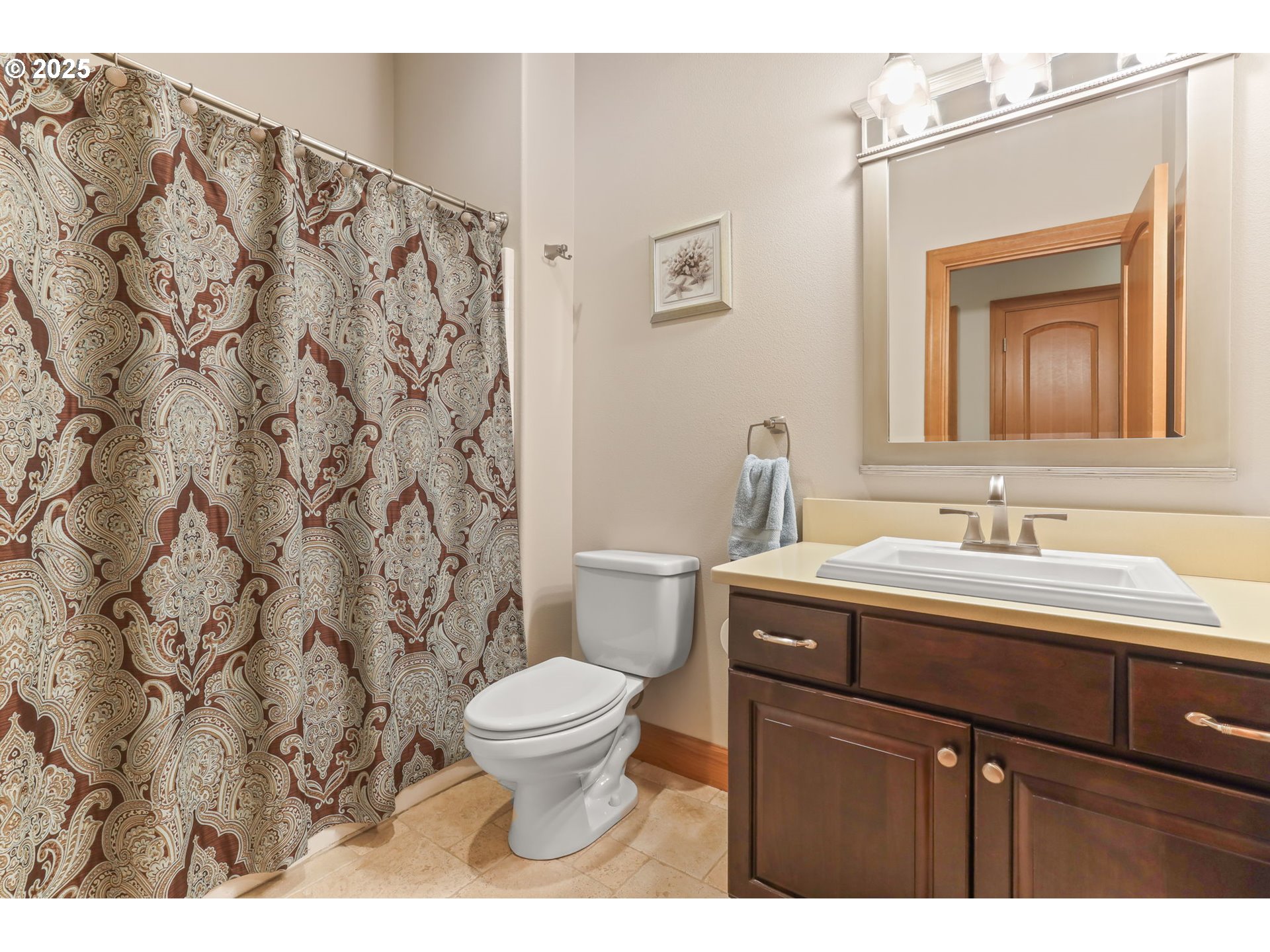 8443 Southeast Orient Drive Gresham, OR 97080 - Photo 19 of 48 a bathroom with a granite countertop sink a toilet and a mirror