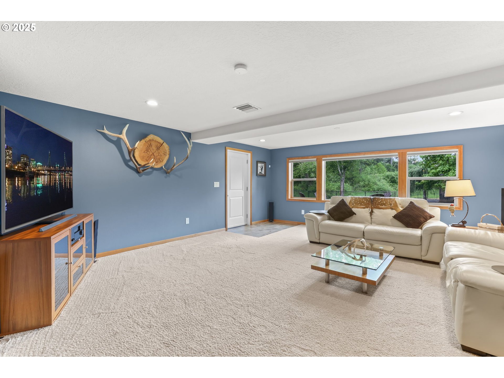 8443 Southeast Orient Drive Gresham, OR 97080 - Photo 28 of 48 a living room with furniture and a large window
