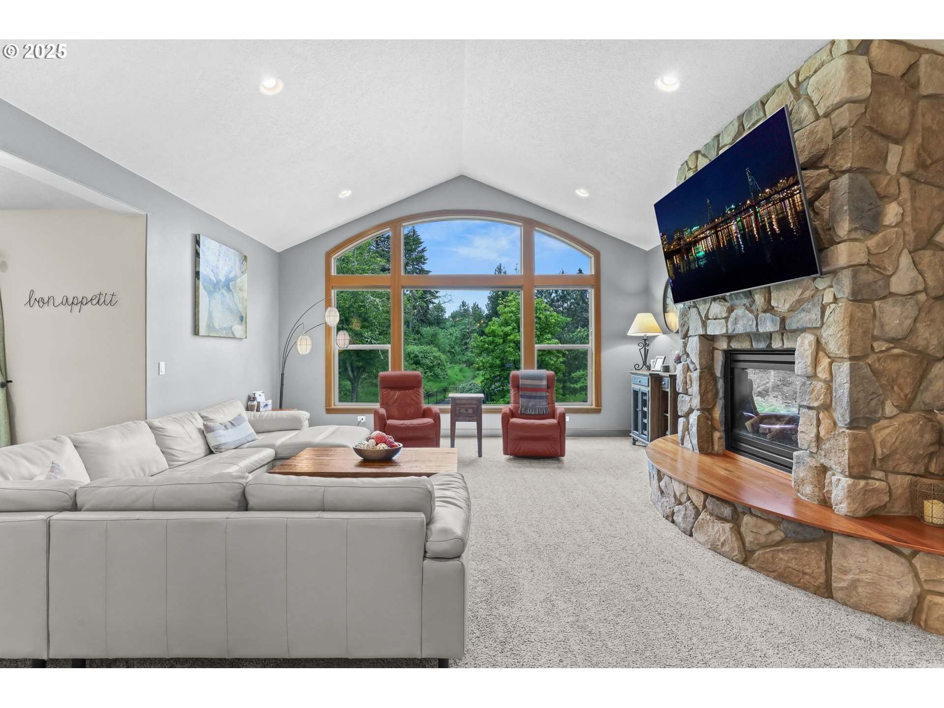 8443 Southeast Orient Drive Gresham, OR 97080 - Photo 3 of 48 a living room with furniture fireplace and a large window