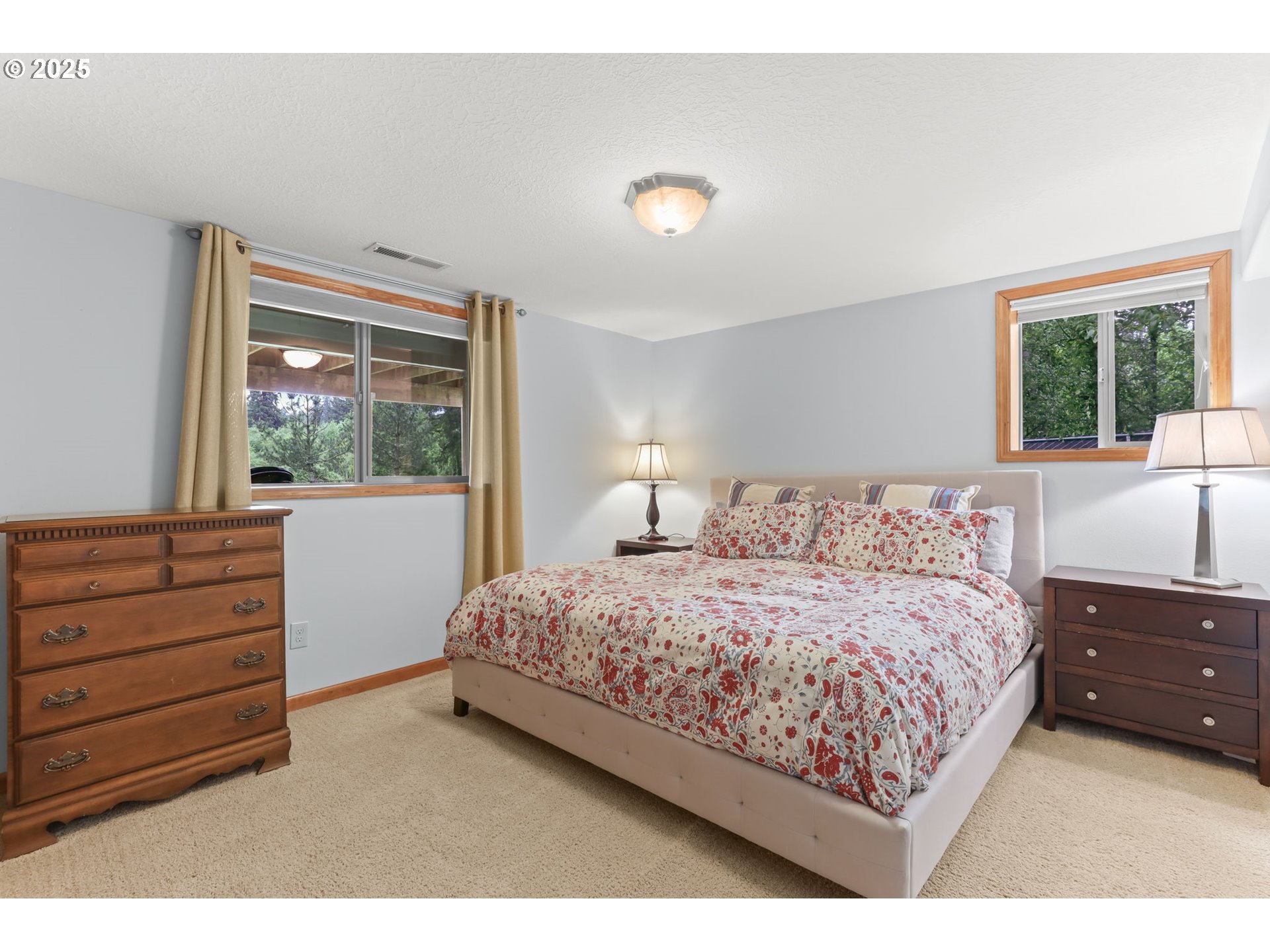 8443 Southeast Orient Drive Gresham, OR 97080 - Photo 36 of 48 a bedroom with a bed and window