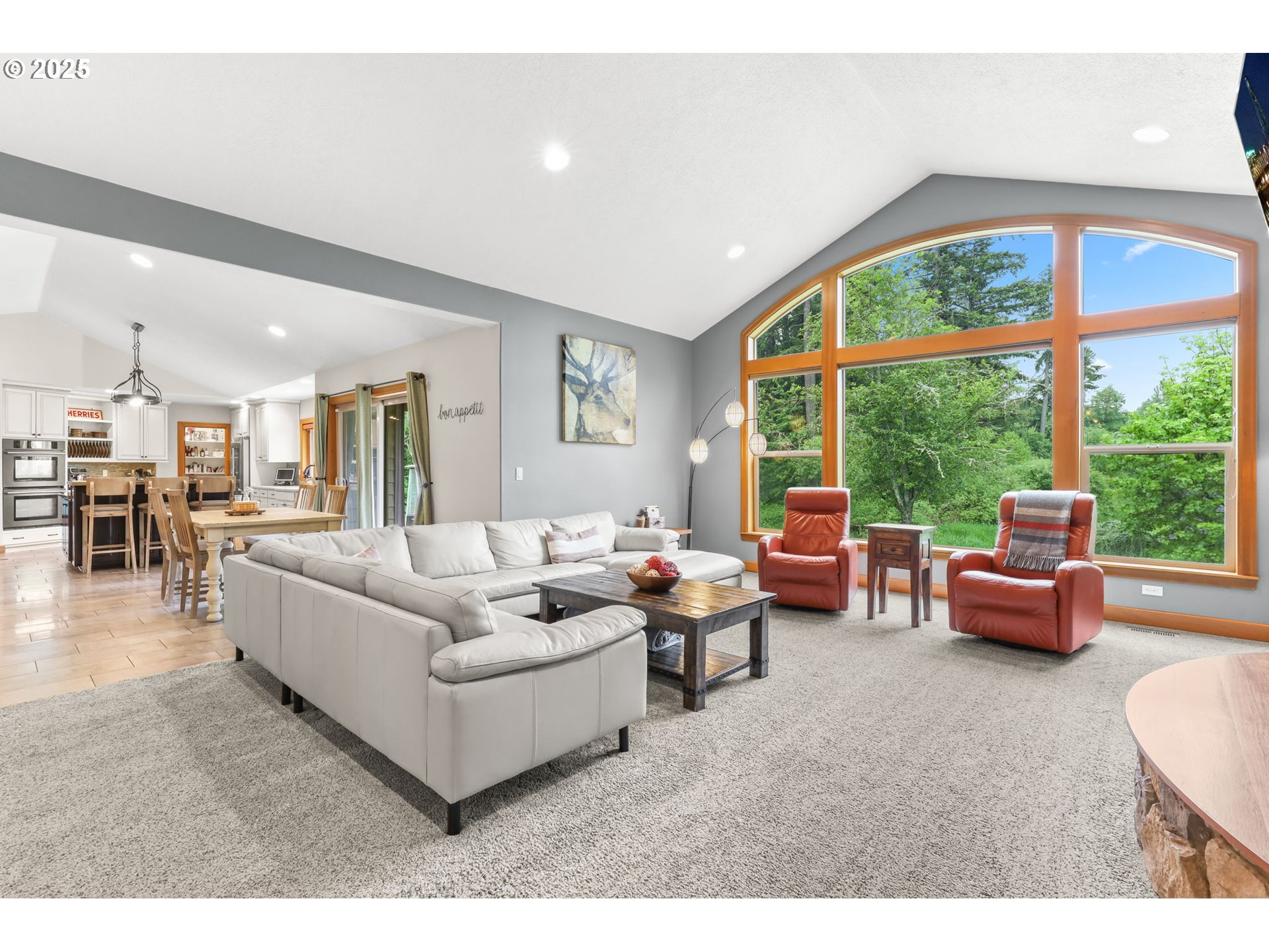 8443 Southeast Orient Drive Gresham, OR 97080 - Photo 4 of 48 a living room with furniture and a large window
