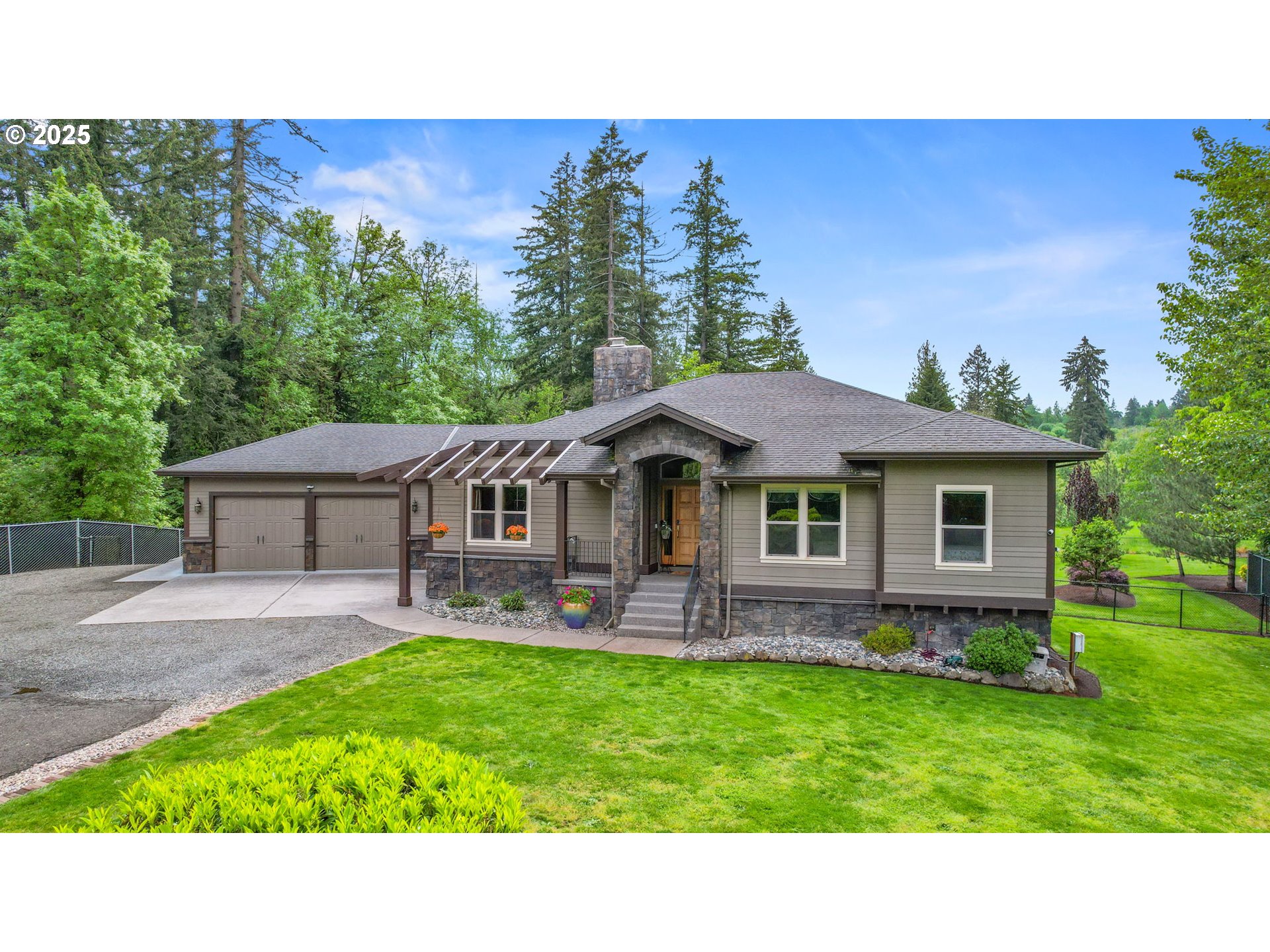 8443 Southeast Orient Drive Gresham, OR 97080 - Photo 48 of 48 a black and white house in front of a big yard with large tree