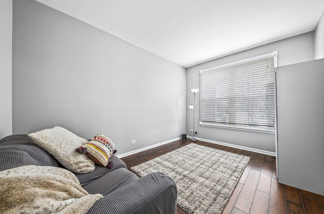 2904 Arbor Lane Aurora, IL 60502 - Photo 13 of 23 a bedroom with a bed and a window