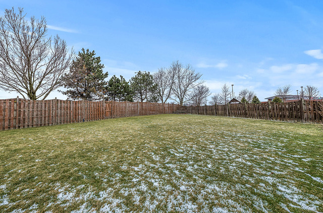 2904 Arbor Lane Aurora, IL 60502 - Photo 22 of 23 a view of outdoor space with deck and yard