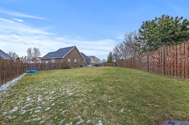 2904 Arbor Lane Aurora, IL 60502 - Photo 23 of 23 a house view with garden space