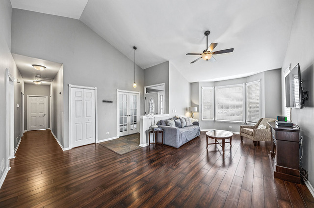 2904 Arbor Lane Aurora, IL 60502 - Photo 4 of 23 a living room with furniture and wooden floor
