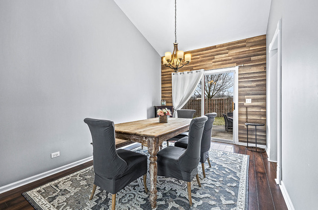 2904 Arbor Lane Aurora, IL 60502 - Photo 7 of 23 a view of a dining room with furniture window and wooden floor