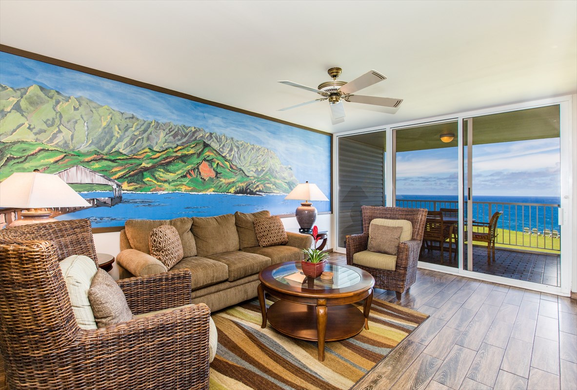 3811 Edward Road, Unit 8204 Princeville, HI 96722 - Photo 7 of 16 a living room with furniture and a wooden floor