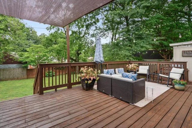 a view of roof deck with patio