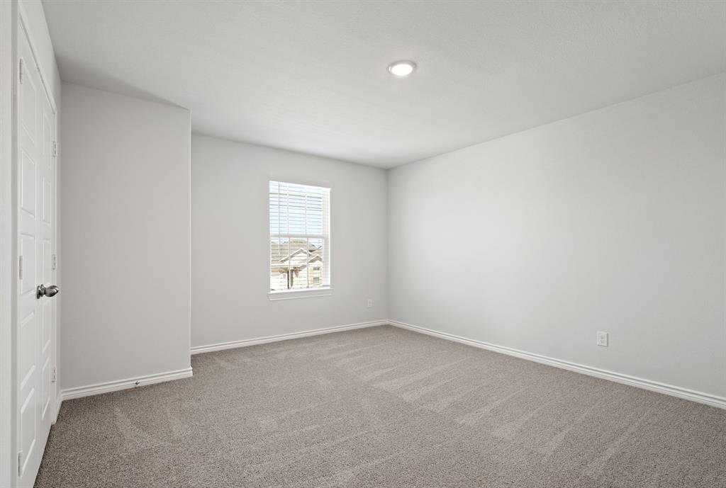 3112 Harmony Way Cleburne, TX 76031 - Photo 13 of 25 a view of an empty room with a window